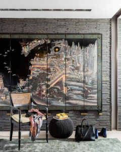 Transitional foyer design, entry, Chinoiserie screen, Asian influence, wall mounted Chinese folding screen, mural, statement wall, stacked stone wall, stacked slate, pouf, grey