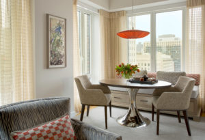 Breakfast nook, built in banquette, transitional dining table, upholstered dining chairs, custom pillows, sheer dining room curtains custom millwork, transitional dining room, small dining area