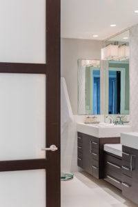 En suite bathroom, master bathroom, basin sink, contemporary bathroom, transitonal bathroom, dressing bench, his and hers sinks, white subway tile, mosaic tile, clean, sleek