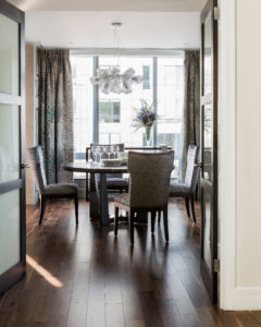 Tranisitonal dining room, contemporary dining room, transitional chandelier, textured wallpaper, irridescent wallpaper, upholstered dining chairs, custom drapery