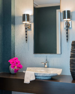Marble sink, basin sink, contemporary sconces, torch sconce, polished chrome accents, custom vanity, wallpaper, turquoise, blue, dark wood, conemporary bathroom,