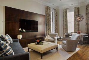 media wall,custom millwork,TV Stands & Units,high ceilings,family room,upholstered ottoman,breakfast nook,custom storage unit,oil rubbed bronze chandelier,caged pendant