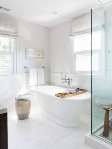 freestanding tub,soaking tub,white bathroom, glass shower enclosure, transitional bathoom design, master bathroom design