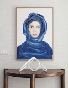 Demilune console table, modern artwork, contemporary portrait, minimalist accessories