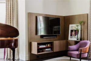 custom millwork,flat panel millwork,media storage,piano,purple,purple side chair,statement color,transitional millwork