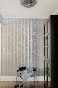 irridescent wallpaper, silver wallpaper, high end wallpaper, birch tree wallpaper, master bedroom entrance, transitional storage cabinet