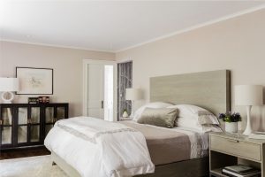 transitional master bedroom, contemporary headboard, neutral wallpaper, custom bedroom furniture, coordinating headboard and nightstand, grey wood bedroom furniture