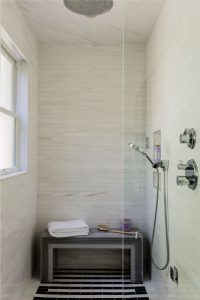 transitional bathroom, contemporary bathroom, walk in shower, curbless shower, stone shower bench, contemporary tile design, contemporary shower floor design, handheld shower, marble shower wall, marble shower tile, rain shower,