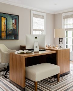 transitional home office, custom home office desk, contemporary L desk, geometric area rug, office desk with ottoman, contemporary art in home office
