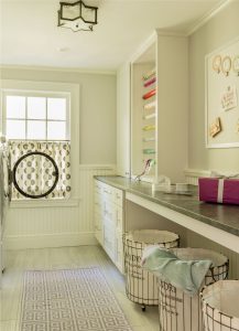 transitional laundry room, wrapping station, lined wire laundry bins, café curtain in laundry room, built in laundry room storage, star semi flush mount