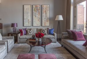 chaise lounge,city view,contemporary living room,picture window,round coffee table,tet a tet,triptych,balcony