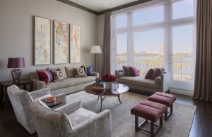 chaise lounge,city view,contemporary living room,picture window,round coffee table,tet a tet,triptych,balcony