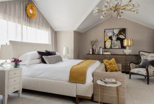 Master Suite, Contemporary Master Bedroom, Gold ceiling light, sofa at end of bed, upholstered bed, alpaca throw