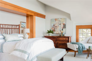 Transitional master bedroom, rustic touched, reclaimed wood headboard, headboard niche, minimal end of bed bench, upholstered bench, chaise lounge, stained moulding, modern rustic