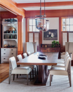 transitional dining room, rustic buffet, antique buffet, antique sideboard, decorative interior columns,decorative ceiling beams, wood beams, transitional dining room furniture,distressed wood dining chair,lakehouse,lakeside view,stained moulding,interior shutters,