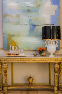 ornate gold console table, gold applied moulding, blue abstract art, gold accents, antique furniture, traditional furniture, black lampshade