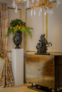 Applied moulding,buffet,living room,modern,silk drapes,transitional,gold accents,gold moulding,bronze sculpture, ornate living room