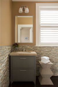 transitional bathroom, tile wall, gray vanity pedestal, geometric side table, small bathroom design