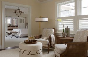 Ottoman with nailhead trim, master suite, master bedroom sitting area, bedroom with natural elements, neutral color pallete bedroom, transitional iron chandelier, transitional bedroom