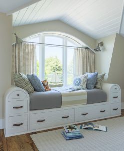 beach house millwork, beach house built in window bench, custom millwork, window bench with storage, reading nook, beach house day bed, shiplap ceiling, transitonal beach house design