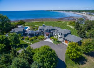 New England beach house, New England home exterior, transitional home exterior, gray exterior paint, white exterior trim, seaside home design, beach house design, sunset, beach house landscape design