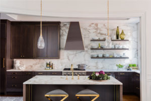 transitional kitchen, contemporary kitchen, dark wood cabinets, open kitchen shelving, metal inlay, brass inlay in cabinets, marble wall, marble backsplash, waterfall edge counter,