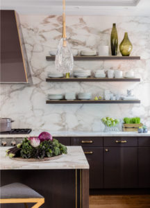 transitional kitchen, contemporary kitchen, dark wood cabinets, open kitchen shelving, metal inlay, brass inlay in cabinets, marble wall, marble backsplash, waterfall edge counter,