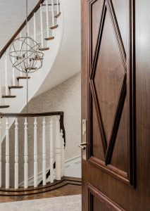 traditional staircasse, spiral staircase, Saturn chandelier, sphere chandelier, entry, inlay door, wood floor, wood door, grand staircase